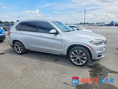 Czwarte zdjęcie samochodu z boku: 2016 BMW X5 XDR40E VIN:5UXKT0C57G0S75672 - miniatura