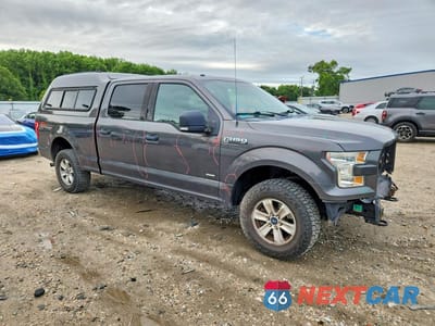 Czwarte zdjęcie samochodu z boku: 2015 FORD F150 SUPERCREW VIN:1FTFW1EG4FFA85452 - miniatura