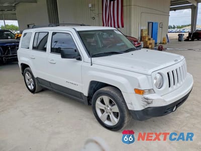 Czwarte zdjęcie samochodu z boku: 2014 JEEP PATRIOT LATITUDE VIN:1C4NJPFB4ED502918 - miniatura