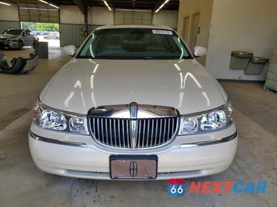Piąte zdjęcie samochodu w środku: 1999 LINCOLN TOWN CAR CARTIER VIN:1LNHM83W4XY622002 - miniatura