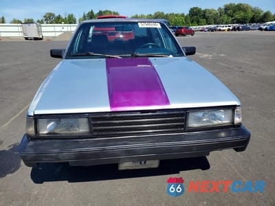 Piąte zdjęcie samochodu w środku: 1986 TOYOTA CAMRY DLX VIN:JT2SV12E0G6025439 - miniatura