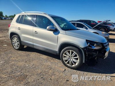 Czwarte zdjęcie samochodu z boku: 2012 VOLKSWAGEN TIGUAN S VIN:WVGBV7AXXCW539771 - miniatura