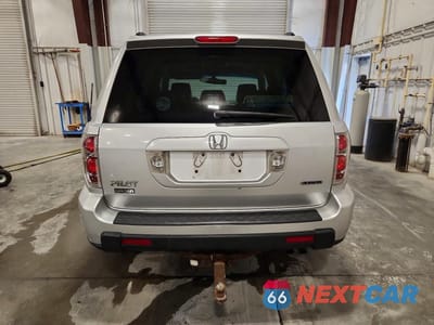 Zdjęcie 6 z 13 samochodu: 2007 HONDA PILOT EXL VIN:2HKYF18627H507401 - miniatura