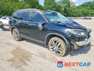Czwarte zdjęcie samochodu z boku: 2017 HONDA PILOT ELITE VIN:5FNYF6H05HB062533 - miniatura