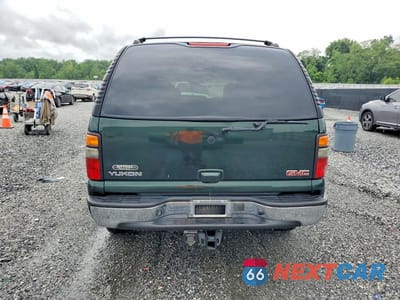 Zdjęcie 6 z 13 samochodu: 2004 GMC YUKON VIN:1GKEC13Z84R255109 - miniatura