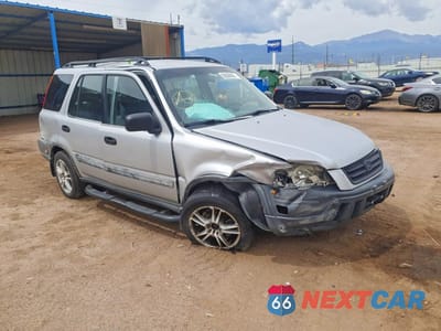 Czwarte zdjęcie samochodu z boku: 1997 HONDA CR-V LX VIN:JHLRD184XVC051314 - miniatura