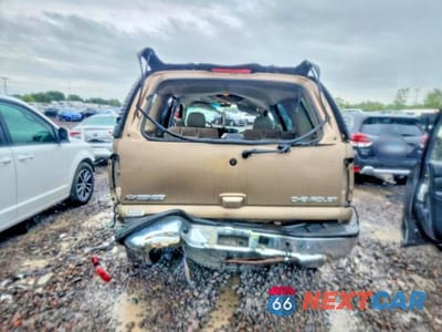 Zdjęcie 6 z 13 samochodu: 2003 CHEVROLET TAHOE K1500 VIN:1GNEK13ZX3J256992 - miniatura