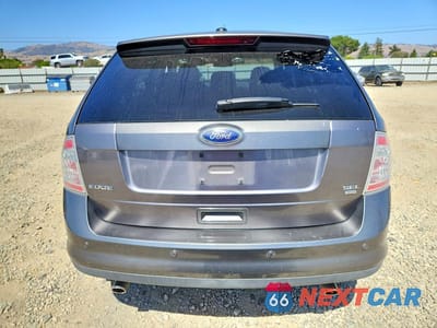 Zdjęcie 6 z 13 samochodu: 2010 FORD EDGE SEL VIN:2FMDK4JC9ABB69506 - miniatura