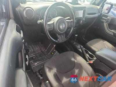 Zdjęcie 8 z 12 samochodu: 2013 JEEP WRANGLER UNLIMITED SPORT VIN:1C4BJWDG0DL630251 - miniatura