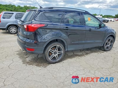 Trzecie zdjęcie samochodu z tyłu: 2019 FORD ESCAPE SEL VIN:1FMCU9HD3KUC47789 - miniatura