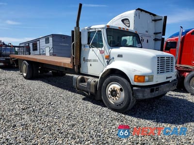 Czwarte zdjęcie samochodu z boku: 1999 INTERNATIONAL 4000 4700 VIN:1HTSCAAL6XH606142 - miniatura