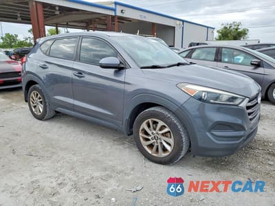 Czwarte zdjęcie samochodu z boku: 2017 HYUNDAI TUCSON SE VIN:KM8J23A40HU254678 - miniatura