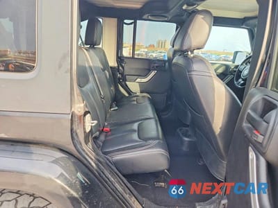 Zdjęcie 11 z 14 samochodu: 2014 JEEP WRANGLER UNLIMITED SAHARA VIN:1C4BJWEG9EL305419 - miniatura