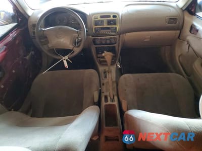 Zdjęcie 8 z 12 samochodu: 2001 TOYOTA COROLLA CE VIN:1NXBR12E91Z457859 - miniatura
