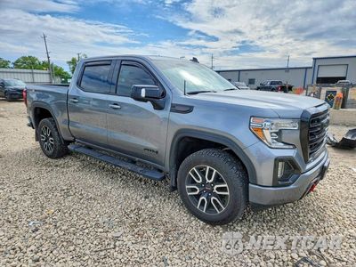 Czwarte zdjęcie samochodu z boku: 2020 GMC SIERRA K1500 AT4 VIN:3GTU9EET9LG424803 - miniatura
