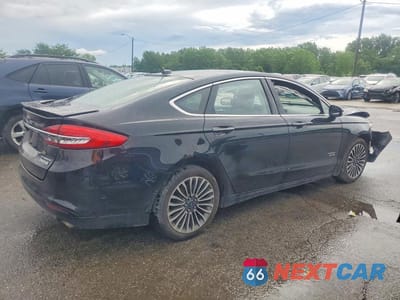 Trzecie zdjęcie samochodu z tyłu: 2017 FORD FUSION TITANIUM PHEV VIN:3FA6P0SU3HR151972 - miniatura