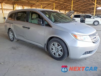 Czwarte zdjęcie samochodu z boku: 2011 HONDA ODYSSEY LX VIN:5FNRL5H29BB006787 - miniatura
