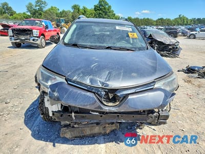 Piąte zdjęcie samochodu w środku: 2016 TOYOTA RAV4 HV XLE VIN:JTMRJREV3GD007833 - miniatura