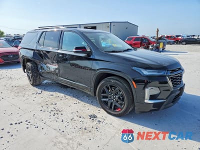 Czwarte zdjęcie samochodu z boku: 2023 CHEVROLET TRAVERSE PREMIER VIN:1GNERKKWXPJ180303 - miniatura