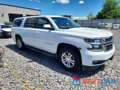 Czwarte zdjęcie samochodu z boku: 2015 CHEVROLET SUBURBAN K1500 LT VIN:1GNSKJKC8FR123430 - miniatura