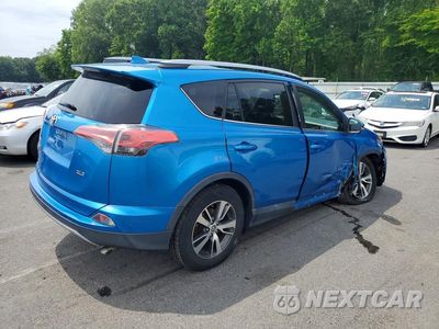 Trzecie zdjęcie samochodu z tyłu: 2018 TOYOTA RAV4 XLE VIN:2T3WFREV2JW411981 - miniatura