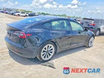 Trzecie zdjęcie samochodu z tyłu: 2022 TESLA MODEL 3 VIN:5YJ3E1EA4NF369667 - miniatura