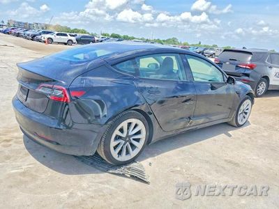 Trzecie zdjęcie samochodu z tyłu: 2022 TESLA MODEL 3 VIN:5YJ3E1EA4NF369667 - miniatura