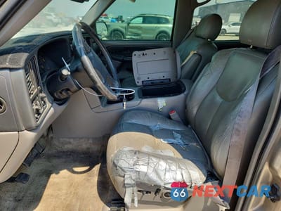 Zdjęcie 7 z 13 samochodu: 2003 GMC YUKON XL C1500 VIN:3GKEC16T53G250438 - miniatura