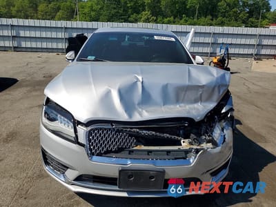 Piąte zdjęcie samochodu w środku: 2017 LINCOLN MKZ RESERVE VIN:3LN6L5F92HR600451 - miniatura