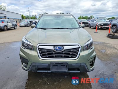 Piąte zdjęcie samochodu w środku: 2021 SUBARU FORESTER PREMIUM VIN:JF2SKAJCXMH576320 - miniatura