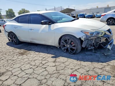 Czwarte zdjęcie samochodu z boku: 2018 NISSAN MAXIMA 3.5 S VIN:1N4AA6AP7JC409487 - miniatura