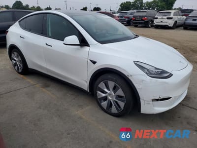 Czwarte zdjęcie samochodu z boku: 2023 TESLA MODEL Y VIN:7SAYGDEE1PA025737 - miniatura