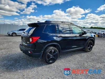 Trzecie zdjęcie samochodu z tyłu: 2021 HONDA PASSPORT ELITE VIN:5FNYF8H06MB000564 - miniatura
