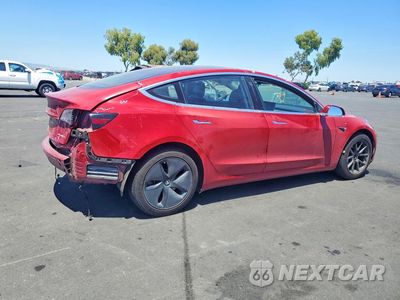 Trzecie zdjęcie samochodu z tyłu: 2018 TESLA MODEL 3 VIN:5YJ3E1EB7JF073397 - miniatura