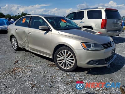 Czwarte zdjęcie samochodu z boku: 2013 VOLKSWAGEN JETTA TDI VIN:3VW3L7AJXDM213011 - miniatura