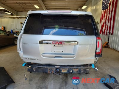 Zdjęcie 6 z 14 samochodu: 2016 GMC YUKON XL DENALI VIN:1GKS2HKJ9GR369926 - miniatura