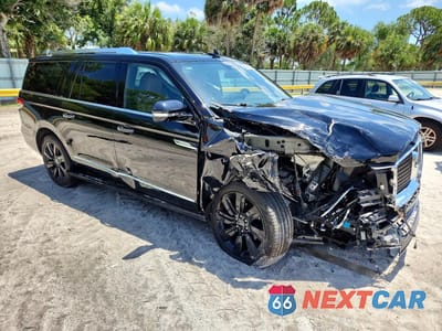 Czwarte zdjęcie samochodu z boku: 2023 LINCOLN NAVIGATOR L RESERVE VIN:5LMJJ3LG9PEL11220 - miniatura