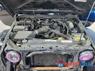 Zdjęcie 11 z 13 samochodu: 2010 JEEP WRANGLER SPORT VIN:1J4AA2D1XAL112136 - miniatura