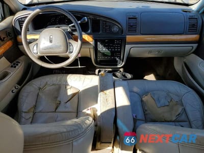 Zdjęcie 8 z 12 samochodu: 2002 LINCOLN CONTINENTAL VIN:1LNHM97V62Y699843 - miniatura