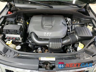 Zdjęcie 12 z 13 samochodu: 2012 JEEP GRAND CHEROKEE LAREDO VIN:1C4RJFAG8CC233789 - miniatura