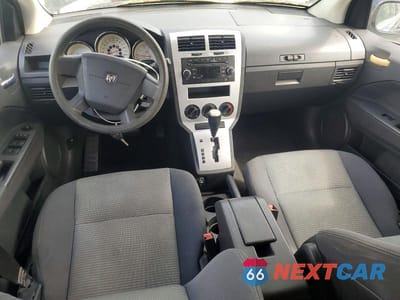 Zdjęcie 8 z 13 samochodu: 2009 DODGE CALIBER SXT VIN:1B3HB48AX9D171170 - miniatura