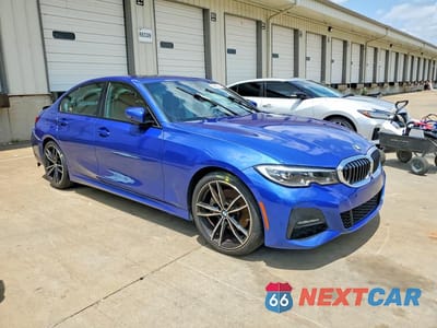 Czwarte zdjęcie samochodu z boku: 2021 BMW 330I VIN:3MW5R1J02M8B85094 - miniatura