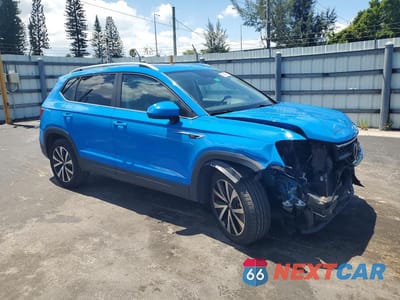 Czwarte zdjęcie samochodu z boku: 2023 VOLKSWAGEN TAOS SE VIN:3VVEX7B23PM377522 - miniatura