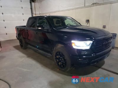 Czwarte zdjęcie samochodu z boku: 2023 RAM 1500 LARAMIE VIN:1C6SRFJM8PN514962 - miniatura