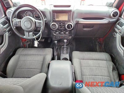 Zdjęcie 8 z 13 samochodu: 2012 JEEP WRANGLER UNLIMITED SAHARA VIN:1C4HJWEG2CL111886 - miniatura