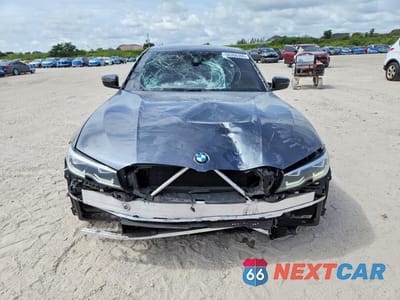 Piąte zdjęcie samochodu w środku: 2021 BMW 330I VIN:3MW5R1J04M8B70158 - miniatura