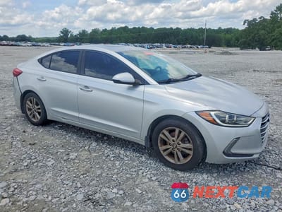 Czwarte zdjęcie samochodu z boku: 2018 HYUNDAI ELANTRA VALUE EDITION VIN:5NPD84LF6JH224217 - miniatura
