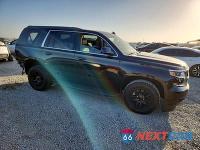 Czwarte zdjęcie samochodu z boku: 2018 CHEVROLET TAHOE C1500 LT VIN:1GNSCBKC2JR234793 - miniatura