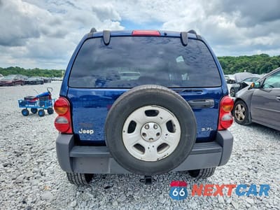 Zdjęcie 6 z 12 samochodu: 2003 JEEP LIBERTY SPORT VIN:1J4GK48K93W619911 - miniatura