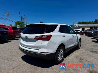 Czwarte zdjęcie samochodu z boku: 2021 CHEVROLET EQUINOX LT VIN:3GNAXKEV9MS119459 - miniatura